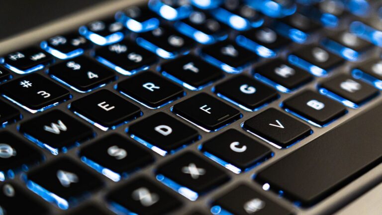 Backlit laptop keyboard representing device security software