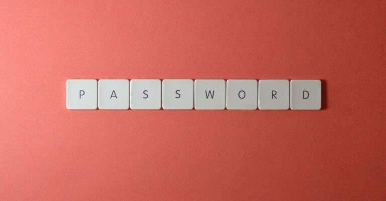 Keyboard tiles spelling the word password on a red background