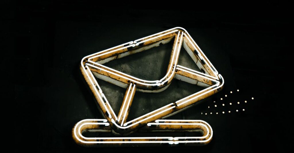 A glowing neon envelope symbol representing email