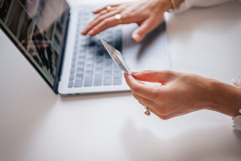 Person making a secure online payment on a laptop