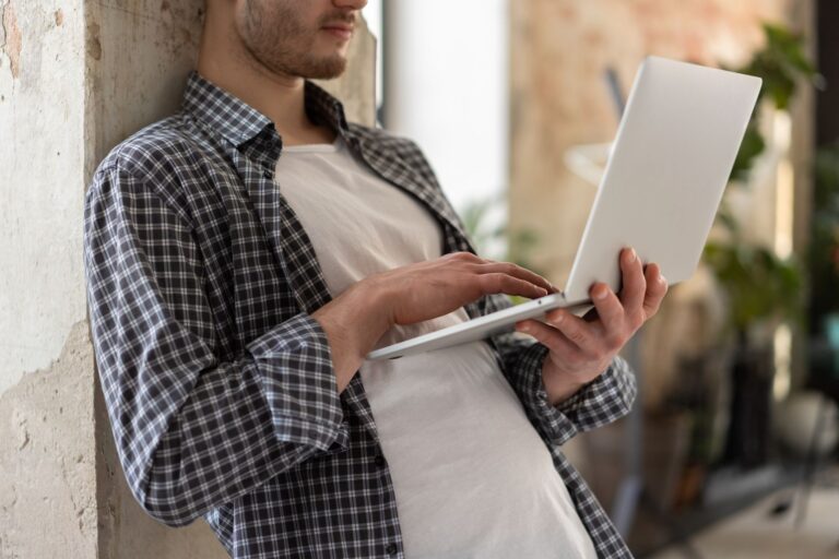 Person using a laptop to open an online account